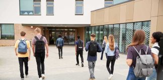 French Students Block Hundreds of Schools Students with backpacks walking toward a school entrance