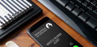 AI Fake Claim Fuels $100K Text Controversy smartphone on desk showing an incoming anonymous call