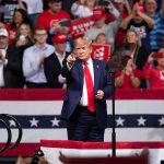 Trump Dances to “Y.M.C.A.” at Texas Rally Donald Trump points from a rally stage; Rudi Koertzen and Bear Pascoe are in the crowd