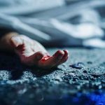 5 Dead Women No One Knew Were Dead Human hand on gritty ground near a covered body