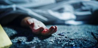 5 Dead Women No One Knew Were Dead Human hand on gritty ground near a covered body