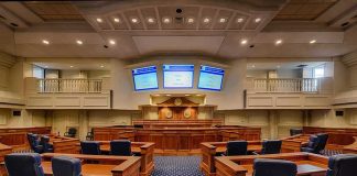 Old Investigation Raises New Questions Courtroom interior with wooden benches and judge's bench